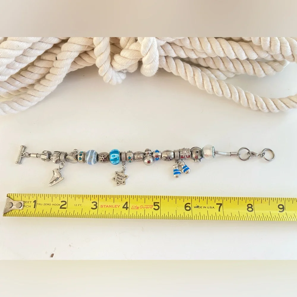 3 for $25 pick and bundle.  🏡🏡🏡 Happy New Year Charm Bracelet